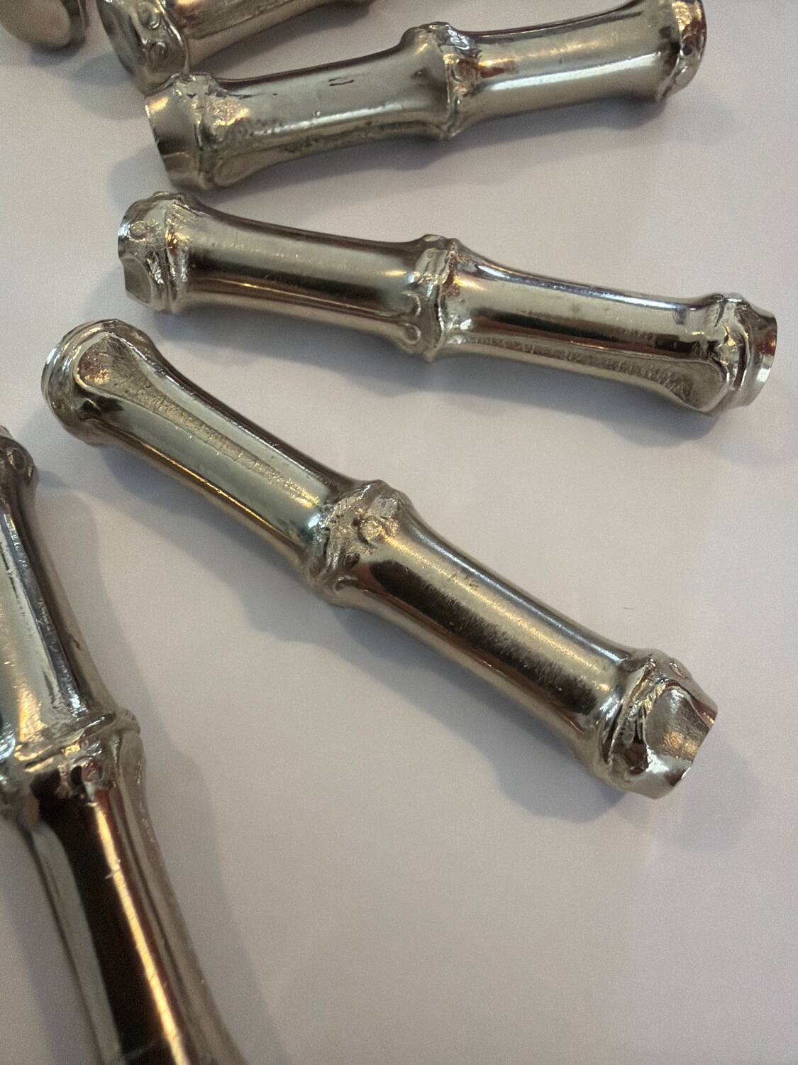 12 porte-couverts en argent