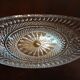 Oval cup on crystal stand