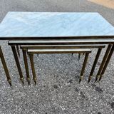 Pull-out table in marble and brass