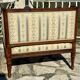 Low armchair in finely carved wood in the Louis XVI style from the 19th century