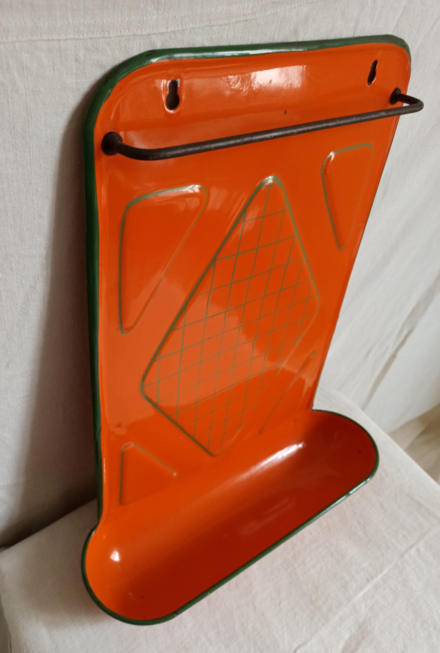 Orange enamelled kitchen utensil door