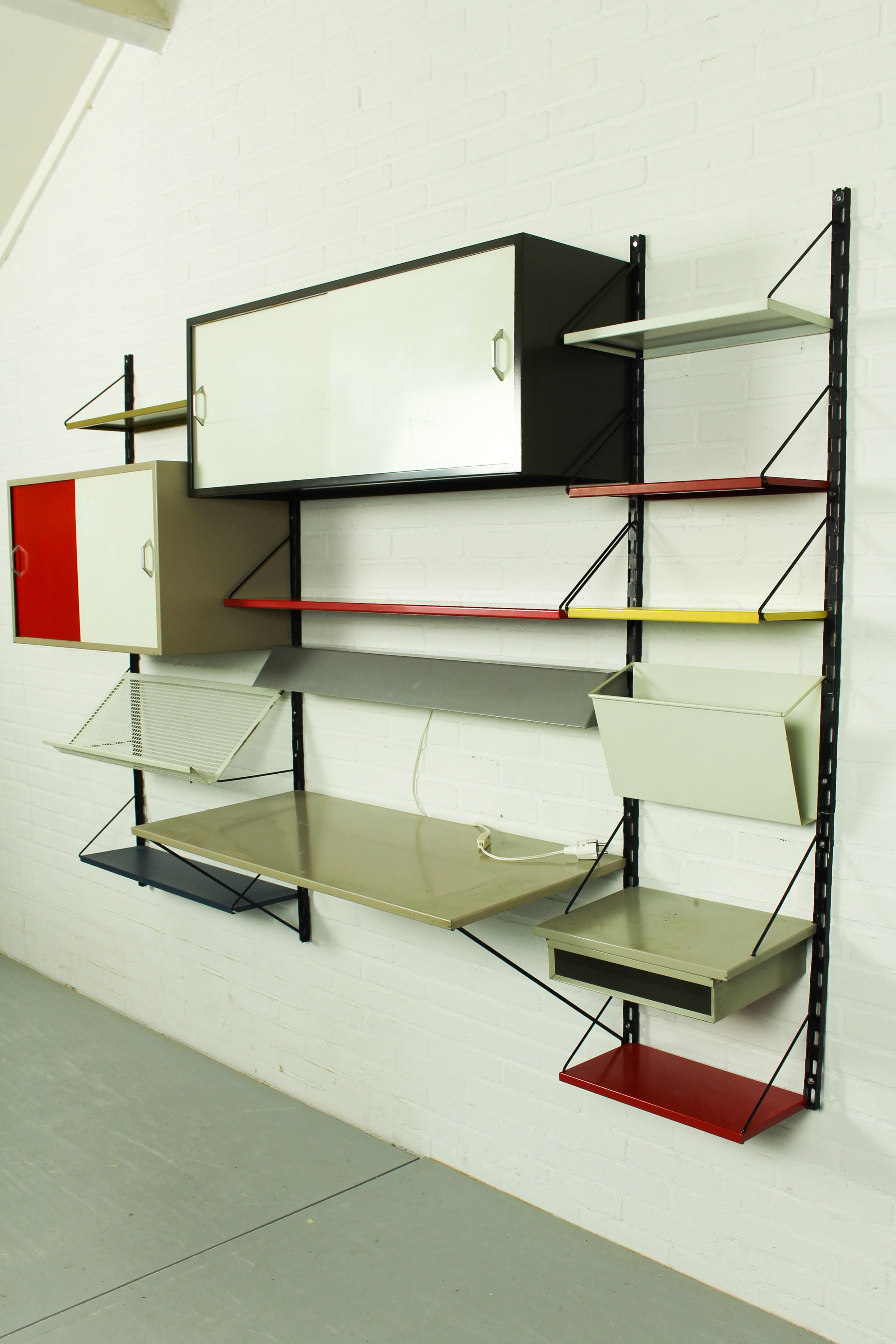 Wall Unit by Tjerk Reijenga for Pilastro with die cut magazine shelve