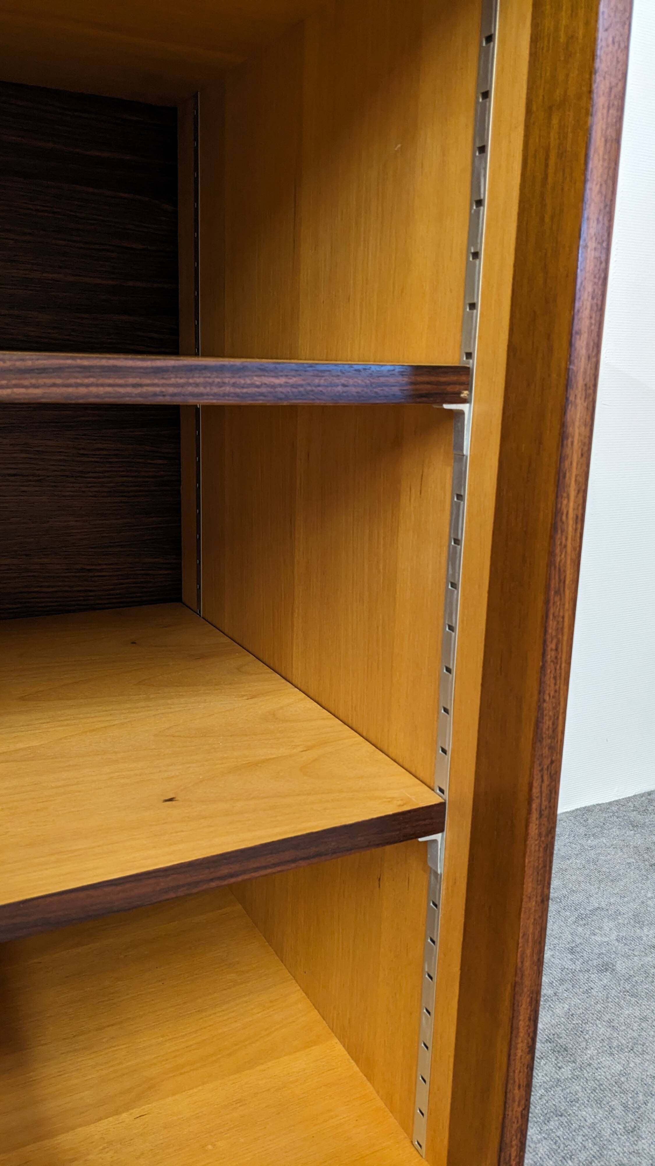 Modernist enfilade in rosewood attributed to O. Borsani, Italy circa 1970.