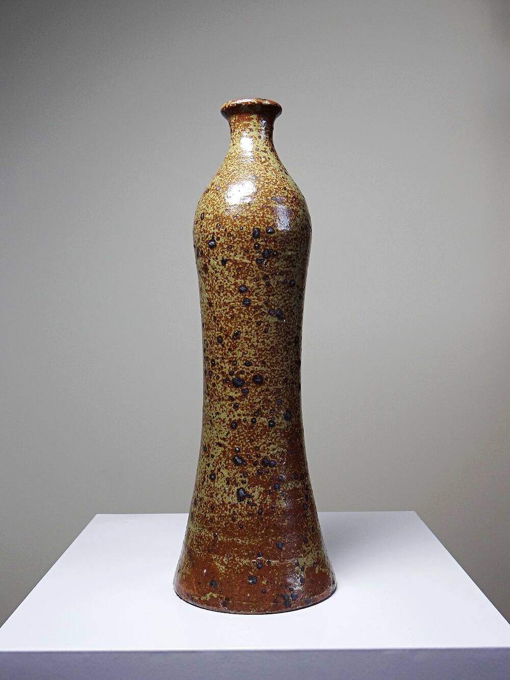 Tall bottle or soliflore in vintage handcrafted enamelled pyrite stoneware from the 60s and 70s