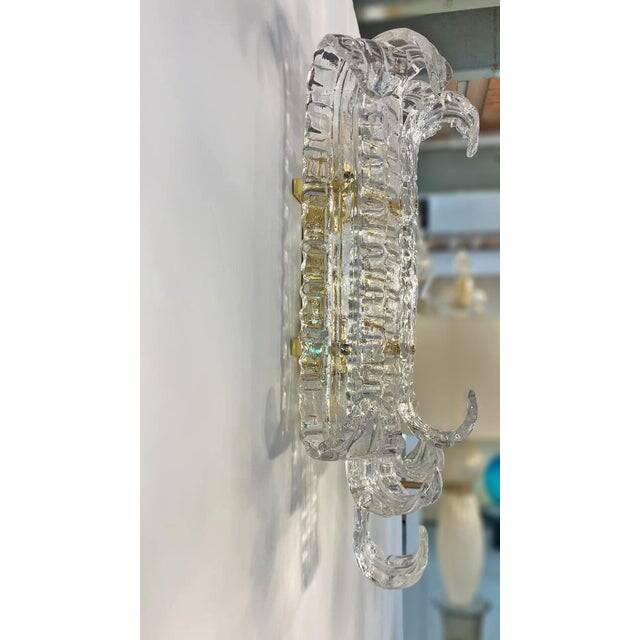 Contemporary transparent "lingue" murano glass wall lamp in barovier style