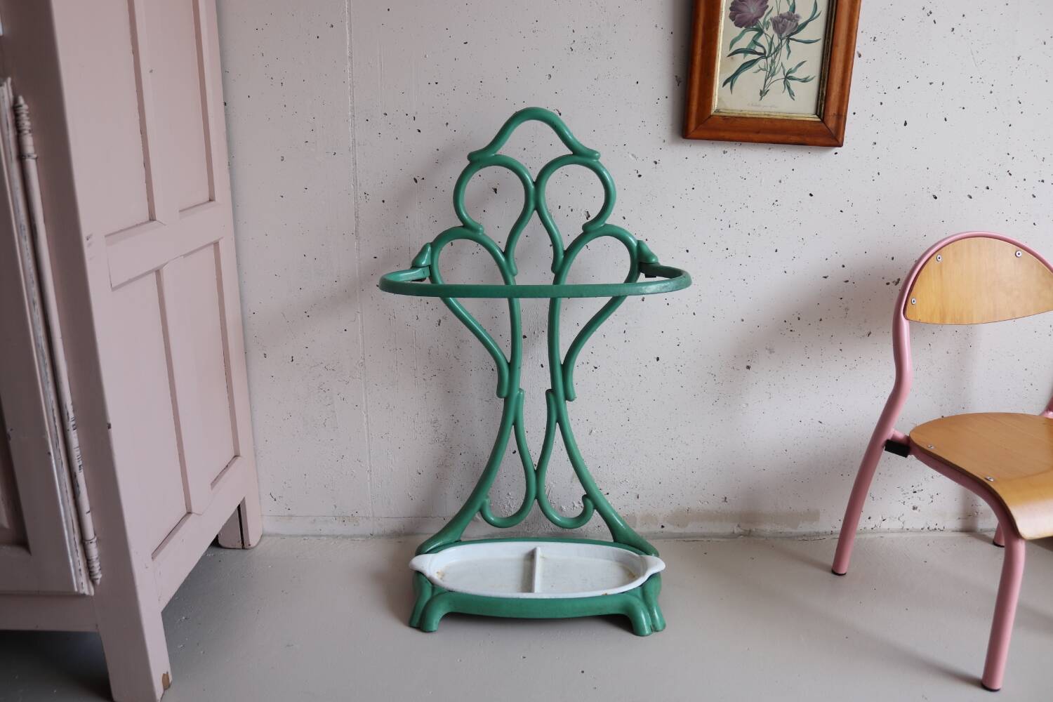 Old green cast iron umbrella stand