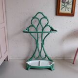 Old green cast iron umbrella stand