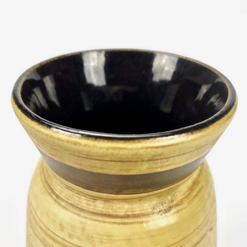 Ethnic trendy striated ivory vase from the 60s