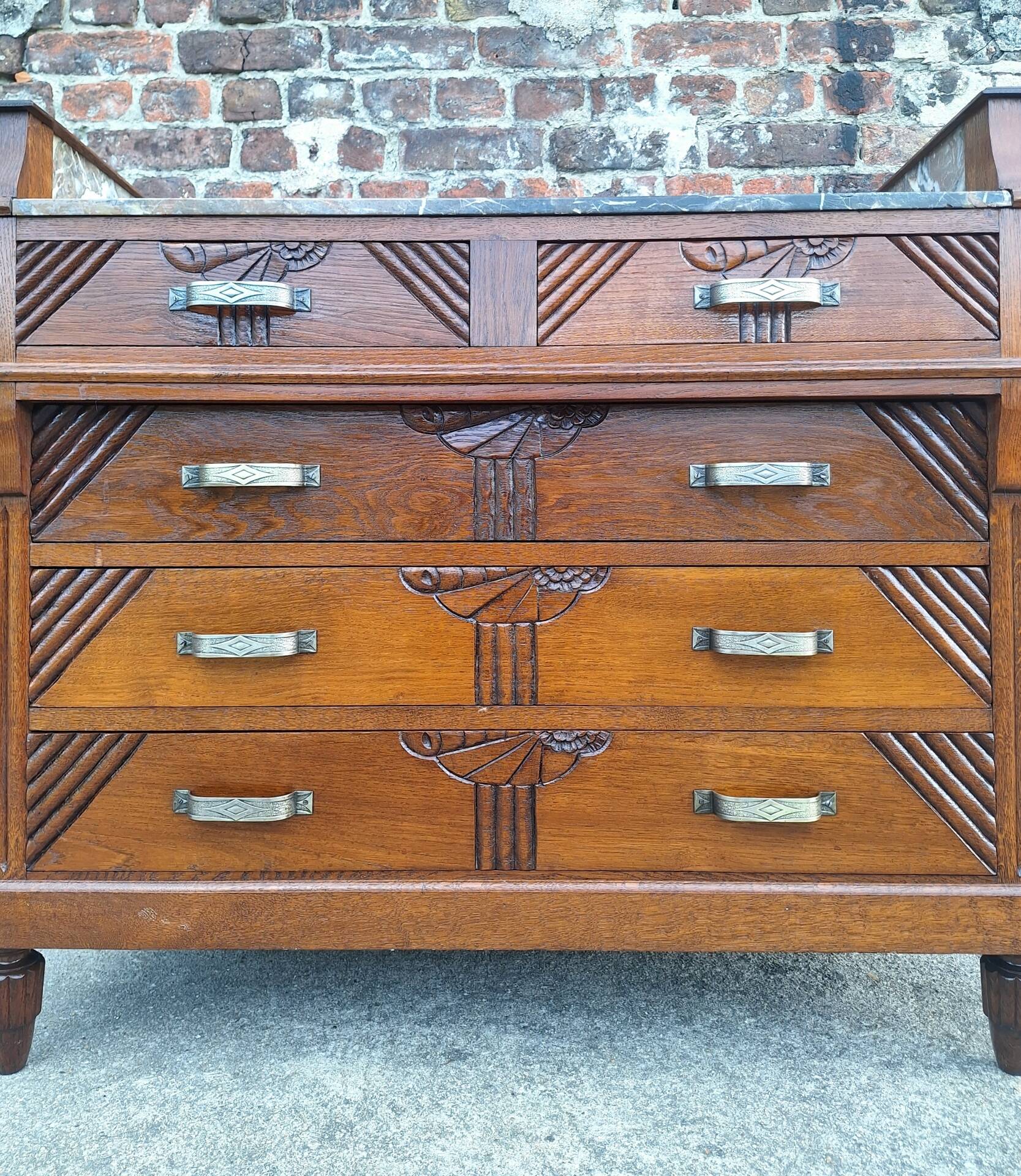 Art Deco commode with marble top, vintage antique furniture.