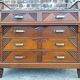 Art Deco commode with marble top, vintage antique furniture.