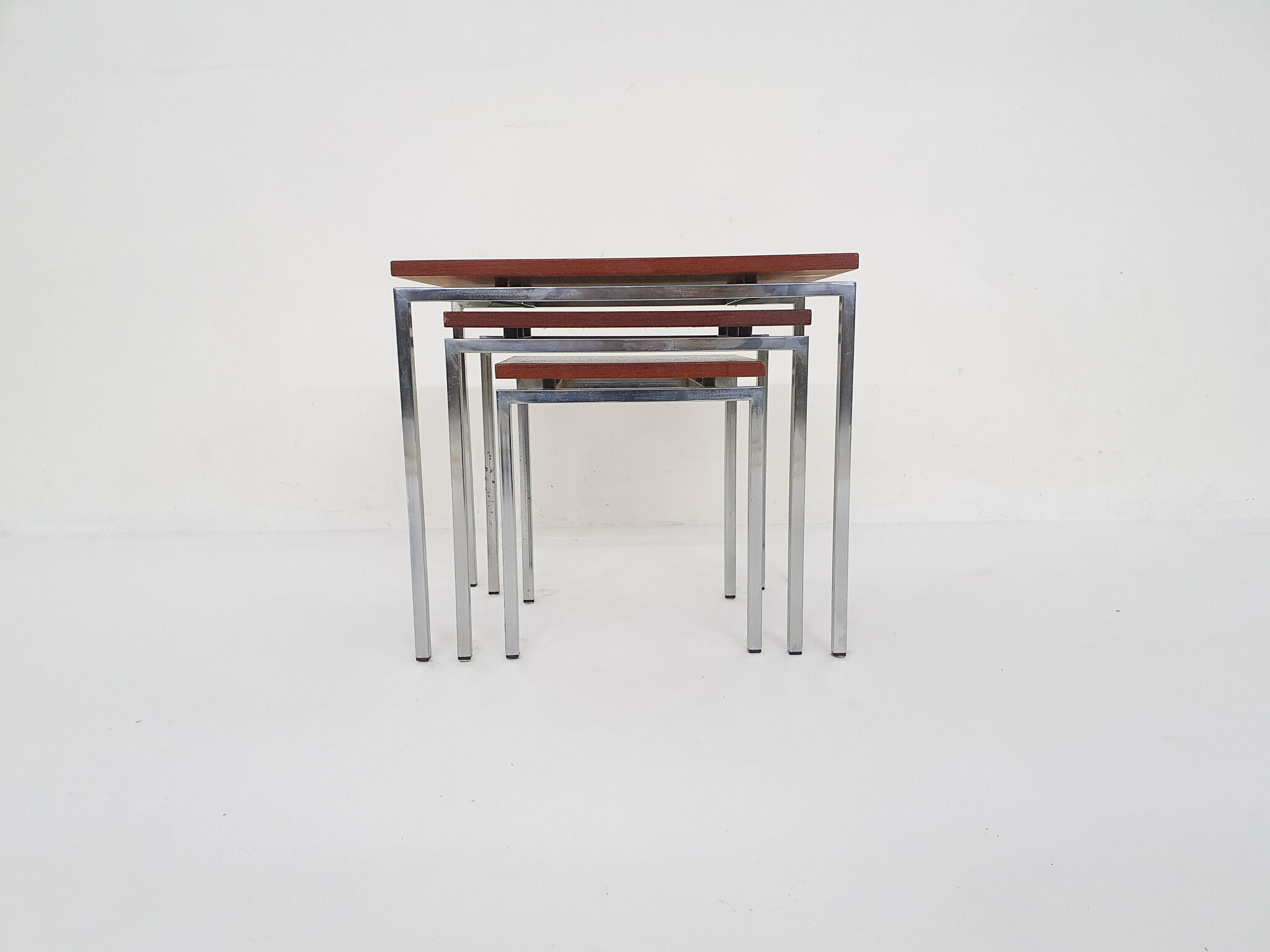 Rosewood and metal nesting tables, The Netherlands 1960's