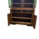Vintage Art Deco display cabinet in wood with green stained glass.