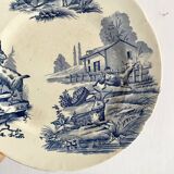 "Rustic" iron earth plate with goats