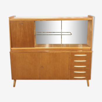 Vintage wooden sideboard with white handles and wall mirror