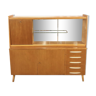 Vintage wooden sideboard with white handles and wall mirror