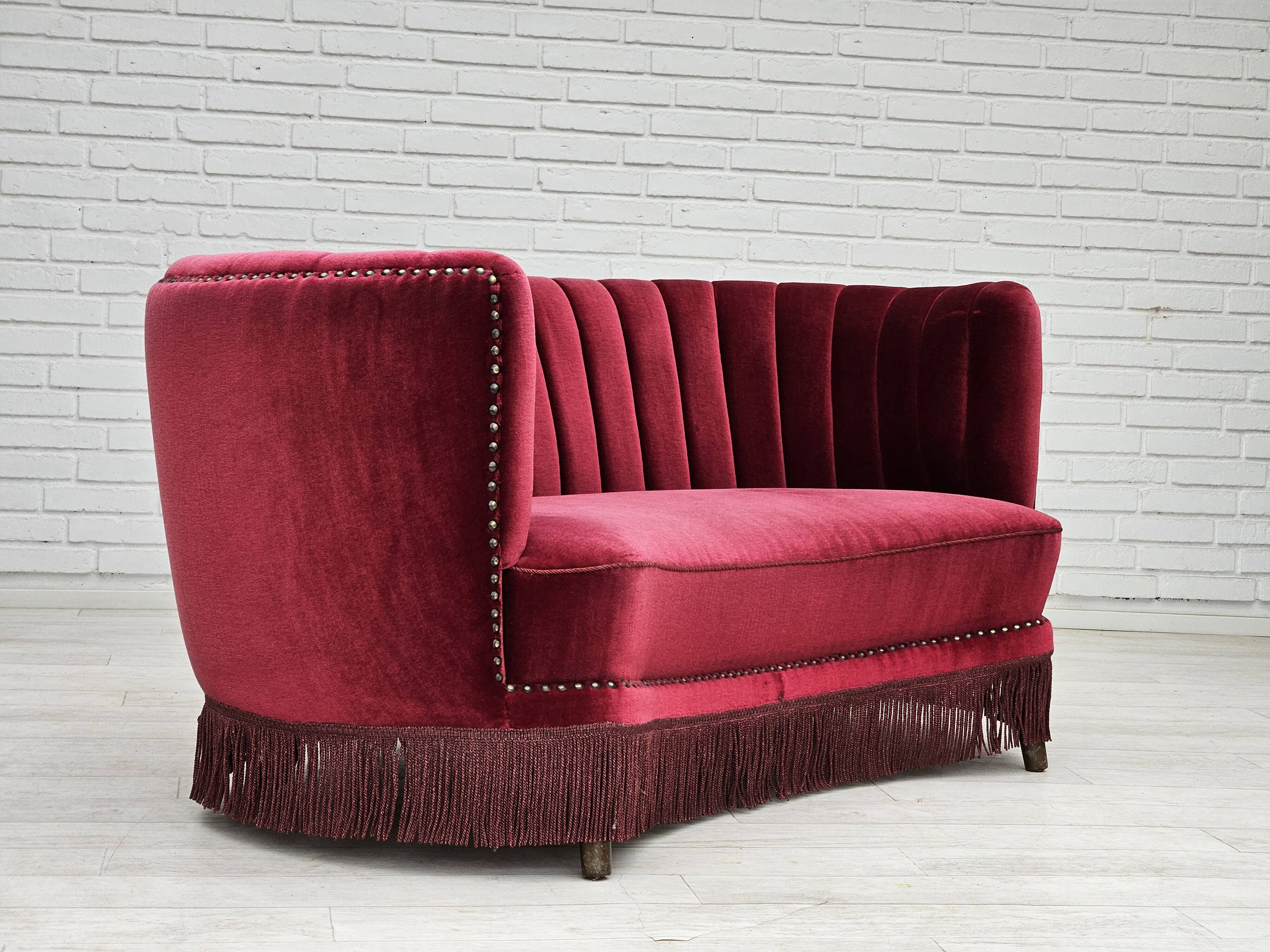1970s, Danish 2-seater "Banana" sofa, original cherry-red velour.