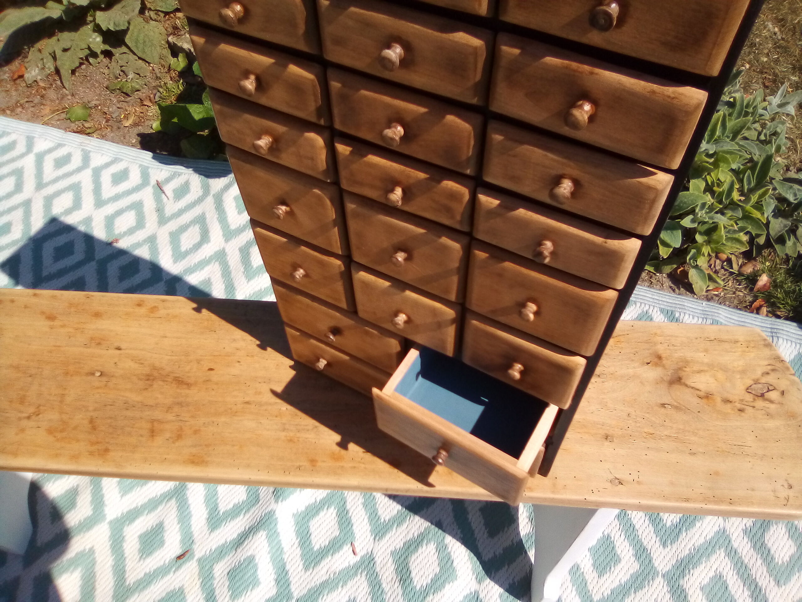 Small furniture with small drawers says layette