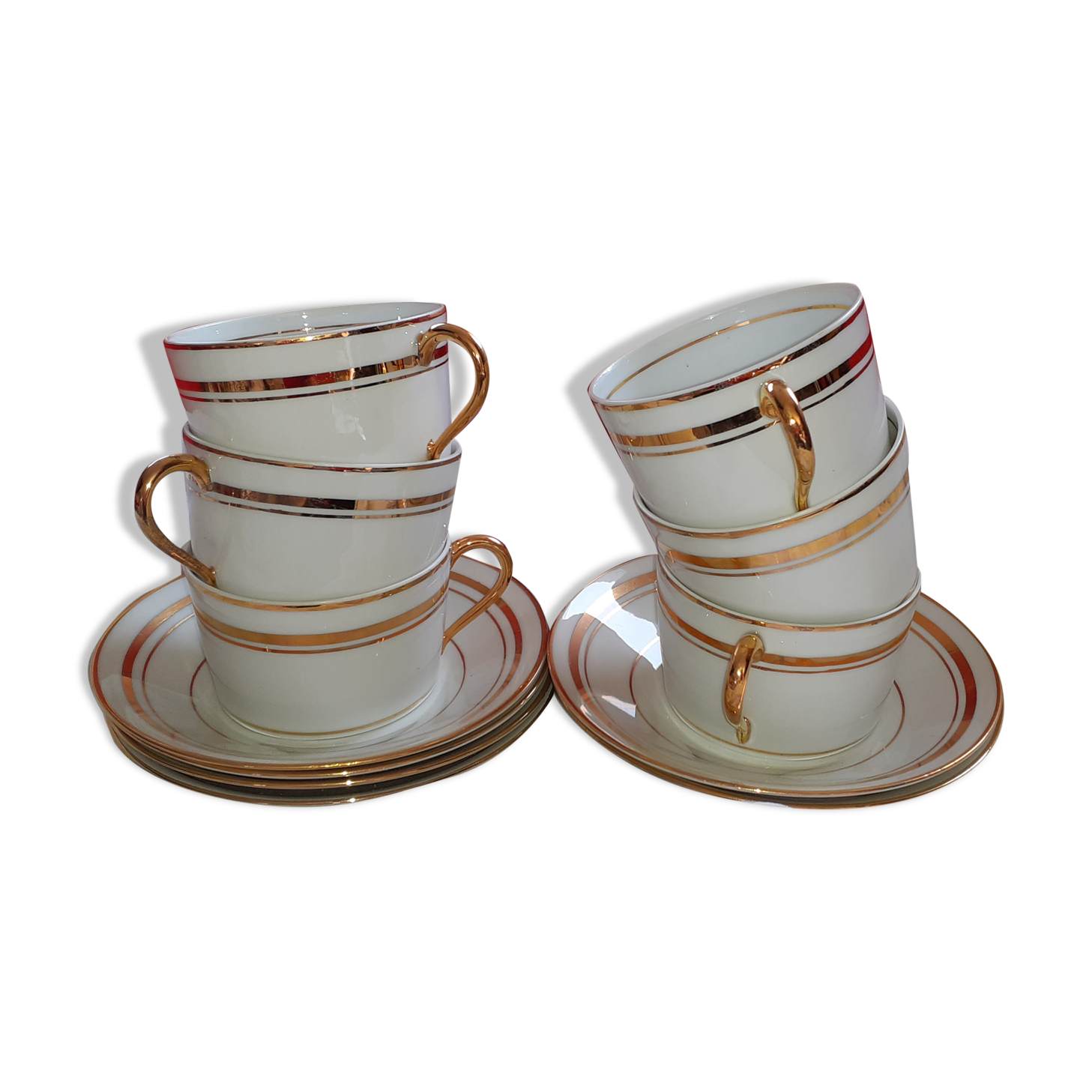 6 white cups and their limoges porcelain saucers. Signed Giroud.