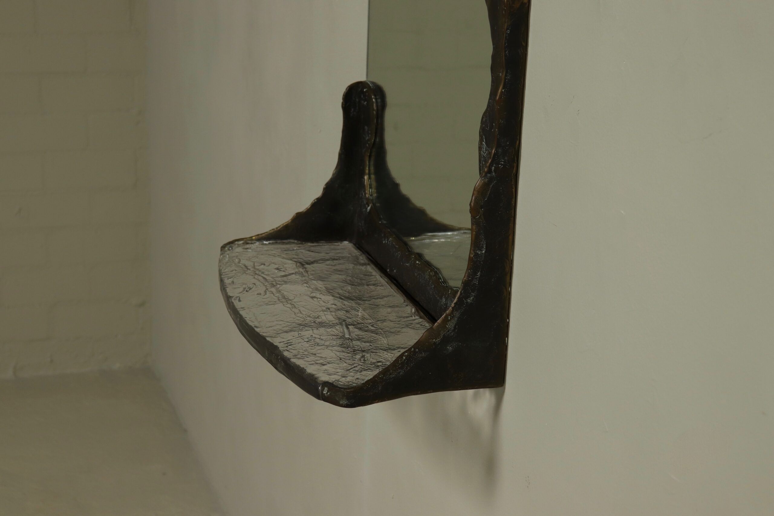 Lothar Klute sculptural bronze wall mirror with glass shelf 1990s