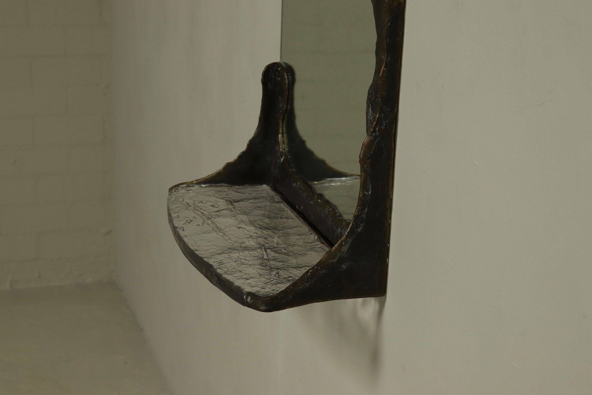 Lothar Klute sculptural bronze wall mirror with glass shelf 1990s