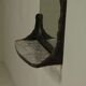 Lothar Klute sculptural bronze wall mirror with glass shelf 1990s