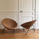 Paire de fauteuils corbeille en rotin pieds métal