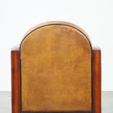Sheep leather and wooden Art Deco design armchair with ball feet