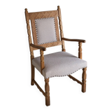 Carved oak armchair by Henning Kjaernulf | Denmark | 1960s