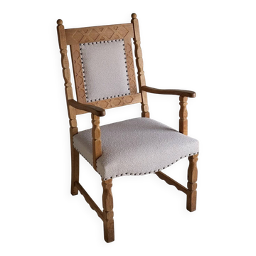 Carved oak armchair by Henning Kjaernulf | Denmark | 1960s