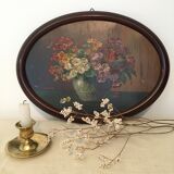 Still life bouquet of priming oval frame