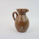 Brown speckled stoneware pitcher in very good condition