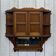 Early 20th-century English wall shelf in walnut.