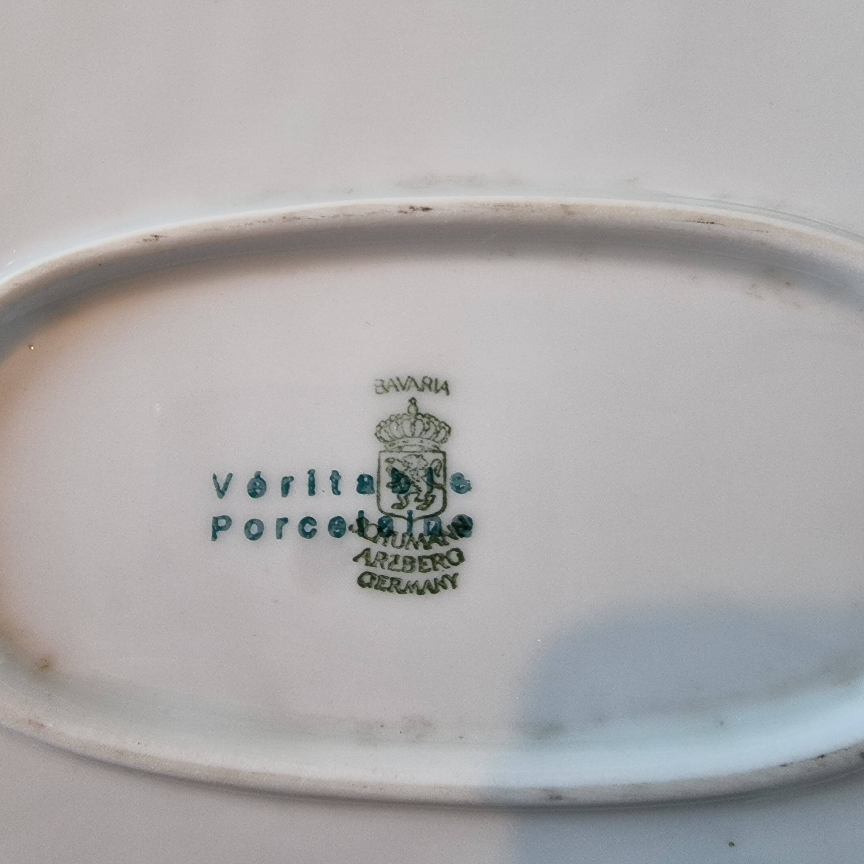 3 serving dishes with frangonard romantic scene with designs and borders in 24 carat gold.