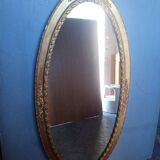 Oval mirror 134cm wood and gilded stucco early 20th century