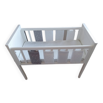 White wooden cradle