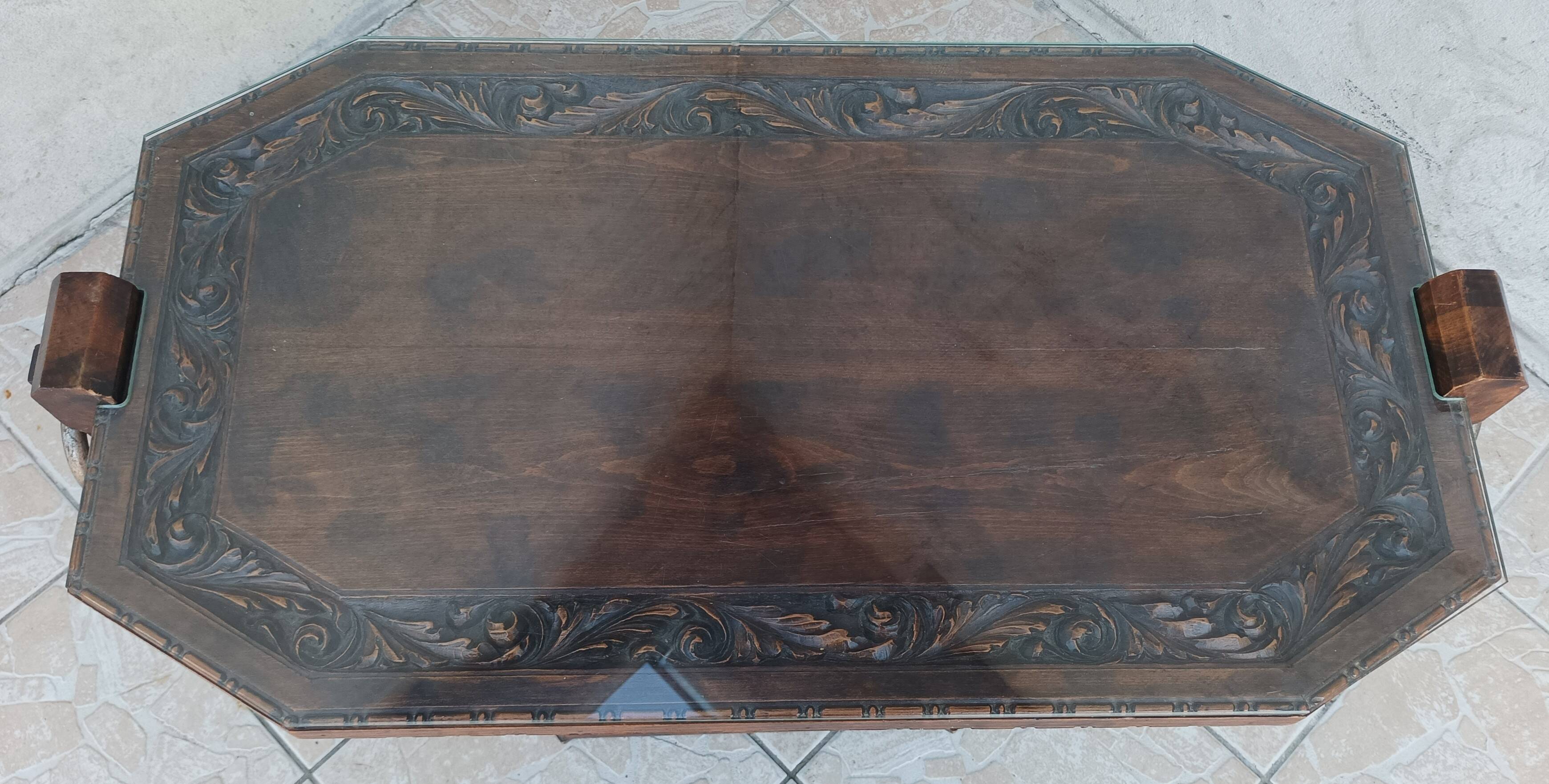Art Deco style coffee table in carved natural wood
