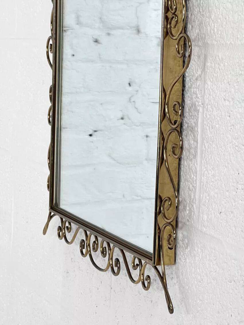 Rectangular mirror from the 50s-60s on a brass frame.
