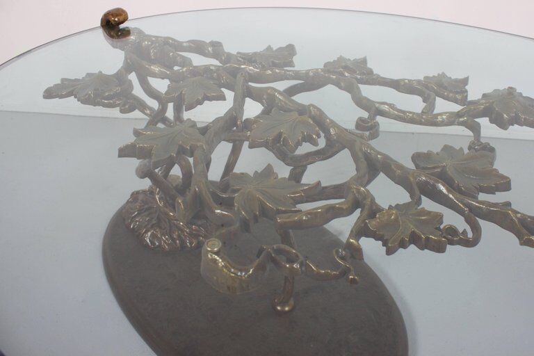 Sculptural bronze and glass coffee table