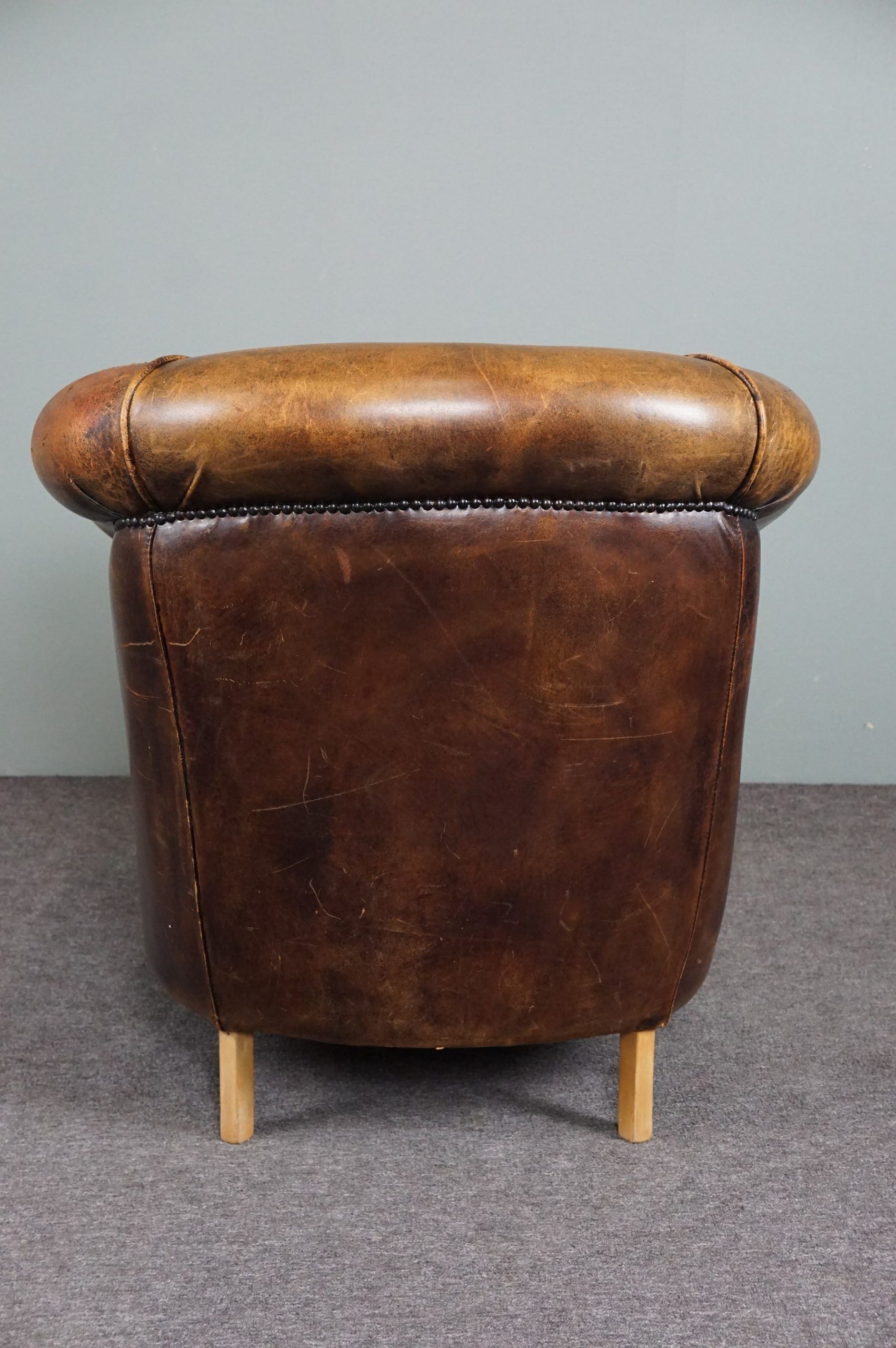 Fauteuil club en cuir de mouton