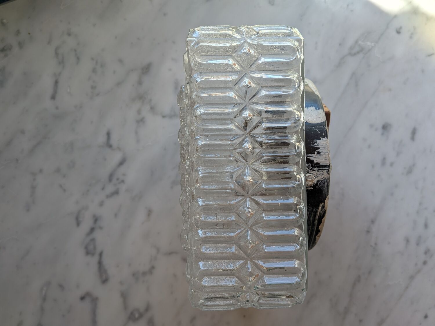 Pressed glass wall light