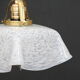 Hanging lamp draped in glass