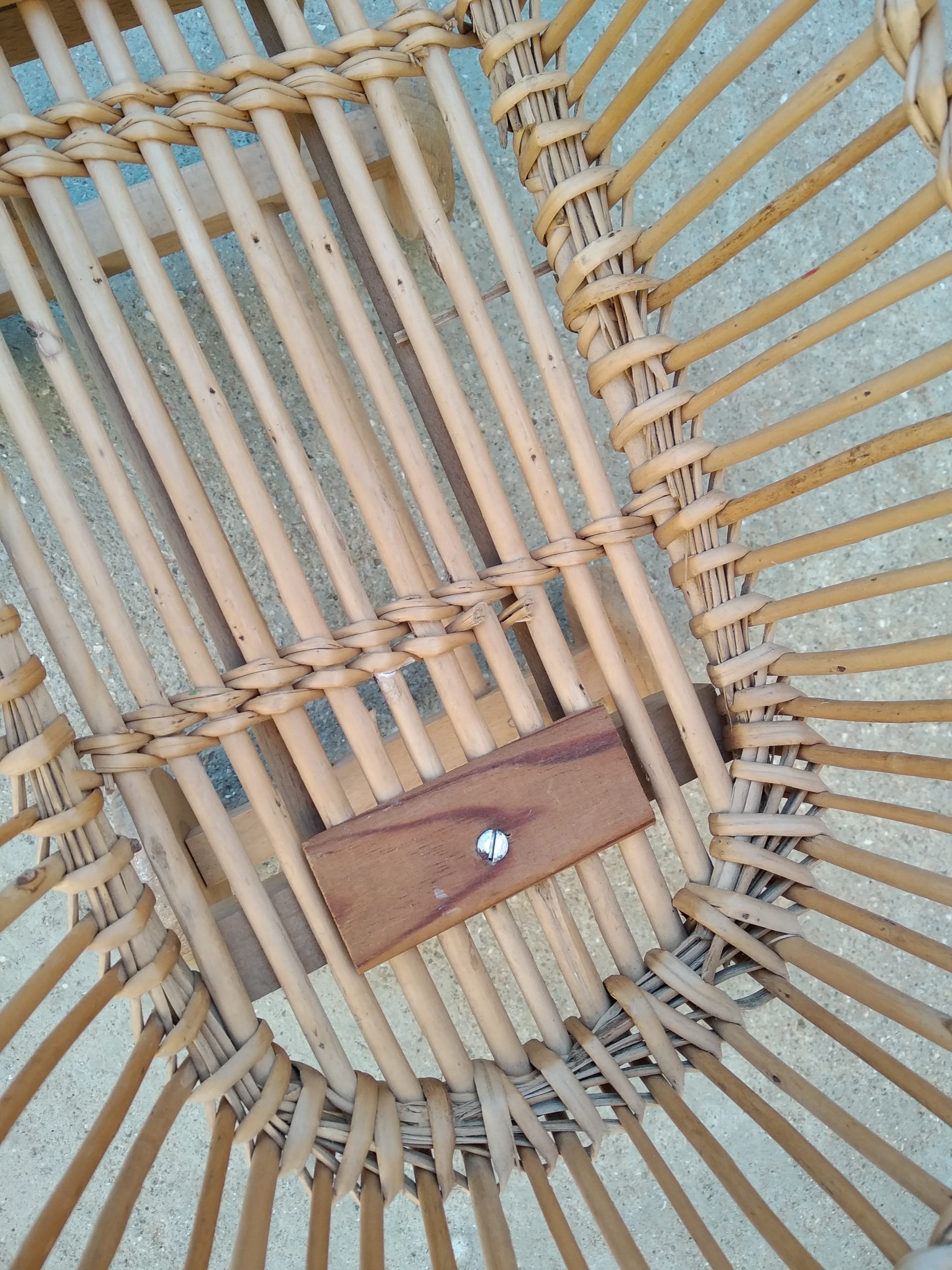 Rattan cradle for doll on vintage wheels