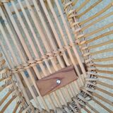 Rattan cradle for doll on vintage wheels