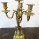 Pair of bronze candelabras and brass bobèches
