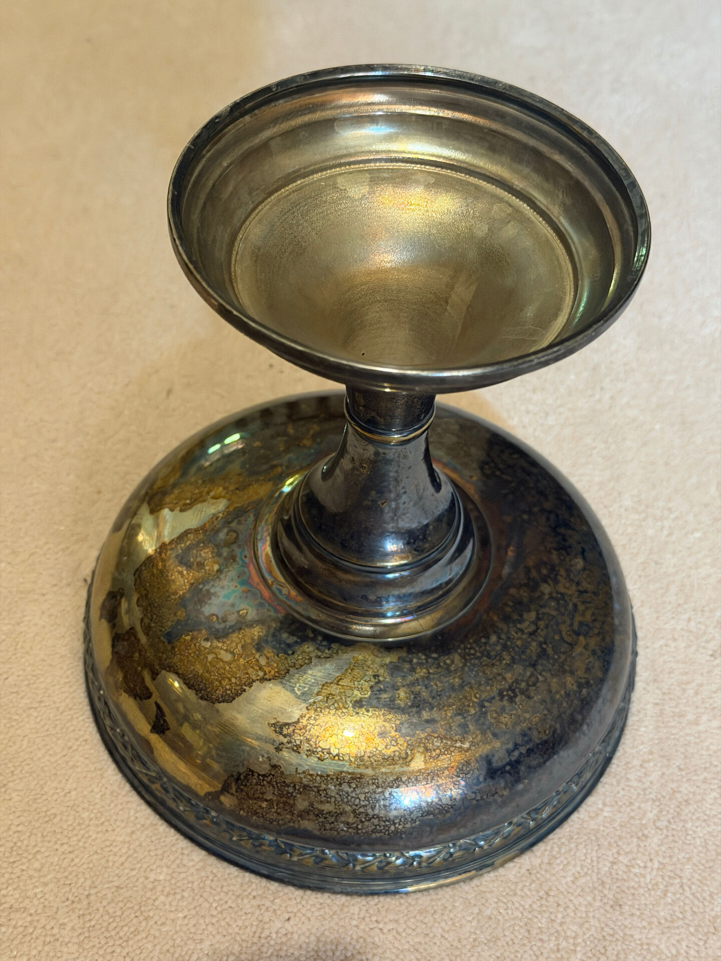 Vintage coupe on a patinated silver-plated metal stand.