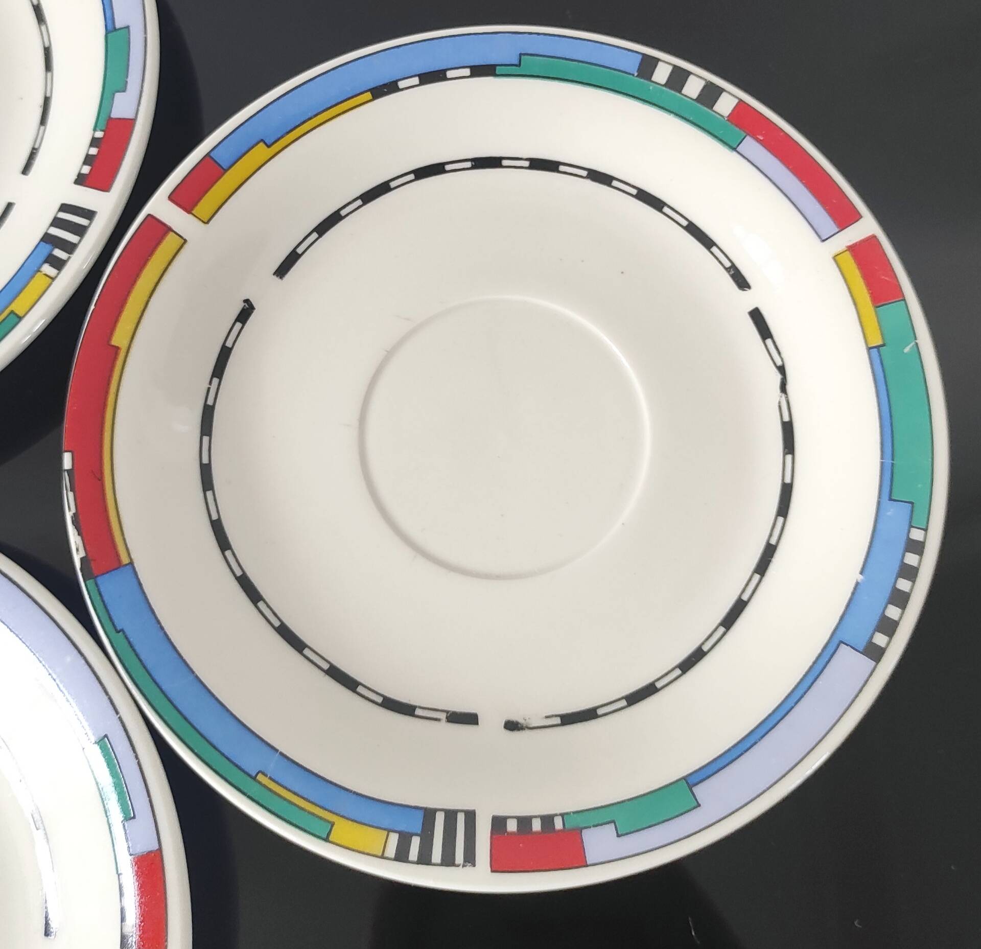 Set of small plates, vintage saucers in porcelain.