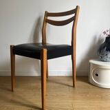 Vintage chair in wood and black leatherette