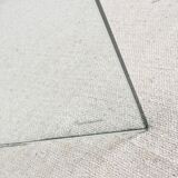 Transparent tempered glass coffee table.