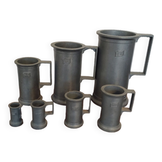 Set of 7 measures in tin