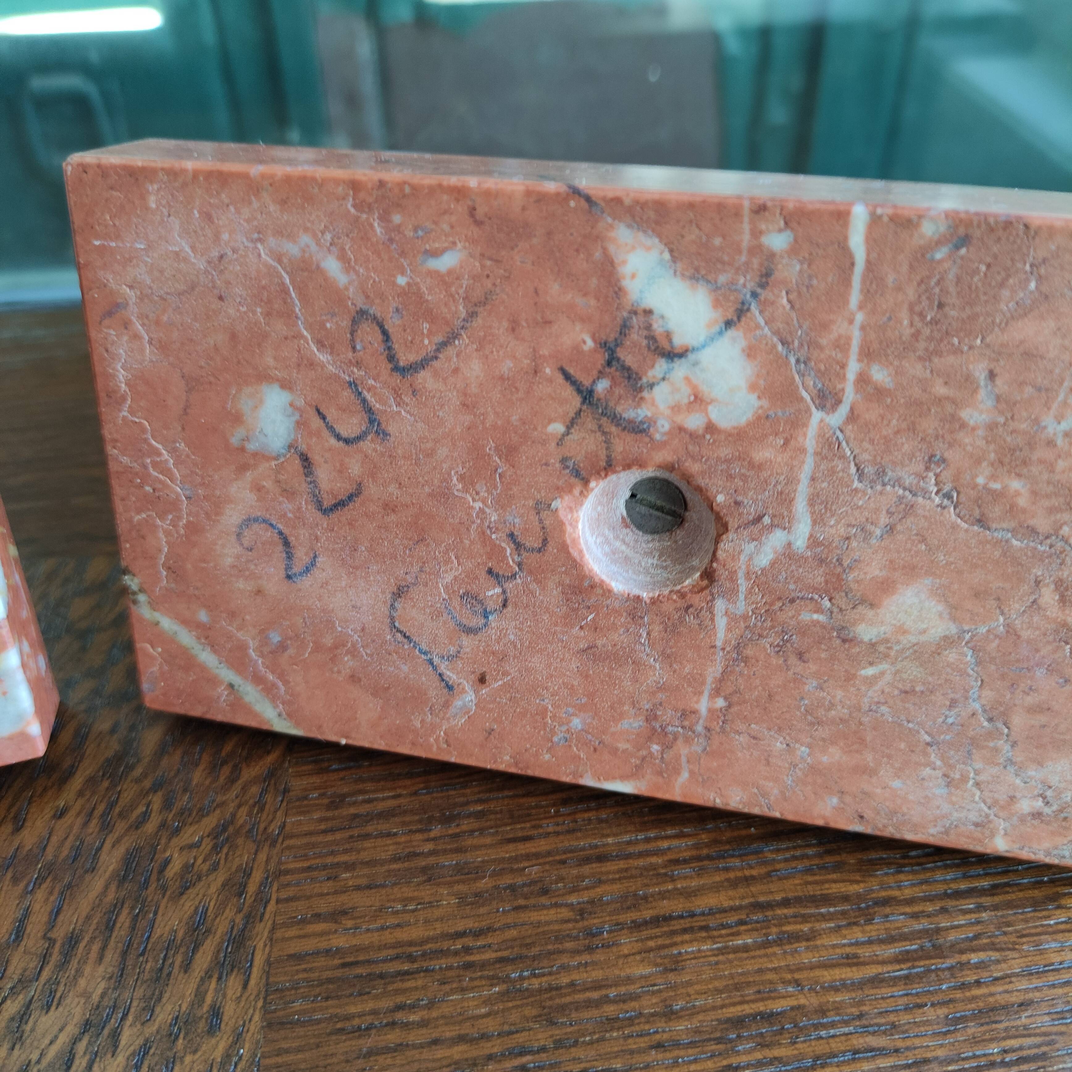 Zinc art bookends in the shape of birds on red marble - warblers